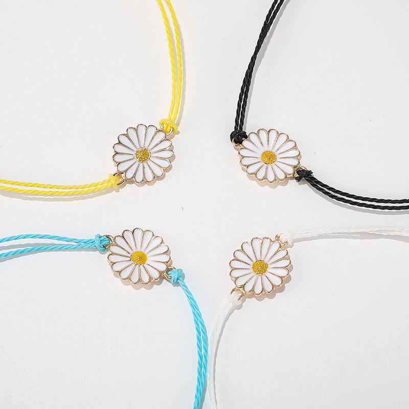 A vibrant Spring Time Multi-Daisies Floral Bracelet featuring colorful daisies on a stretchable brass chain, perfect for all wrist sizes.