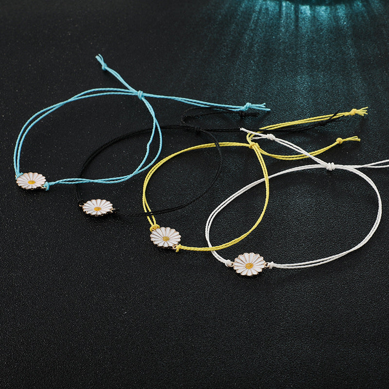 A vibrant Spring Time Multi-Daisies Floral Bracelet featuring colorful daisies on a stretchable brass chain, perfect for all wrist sizes.