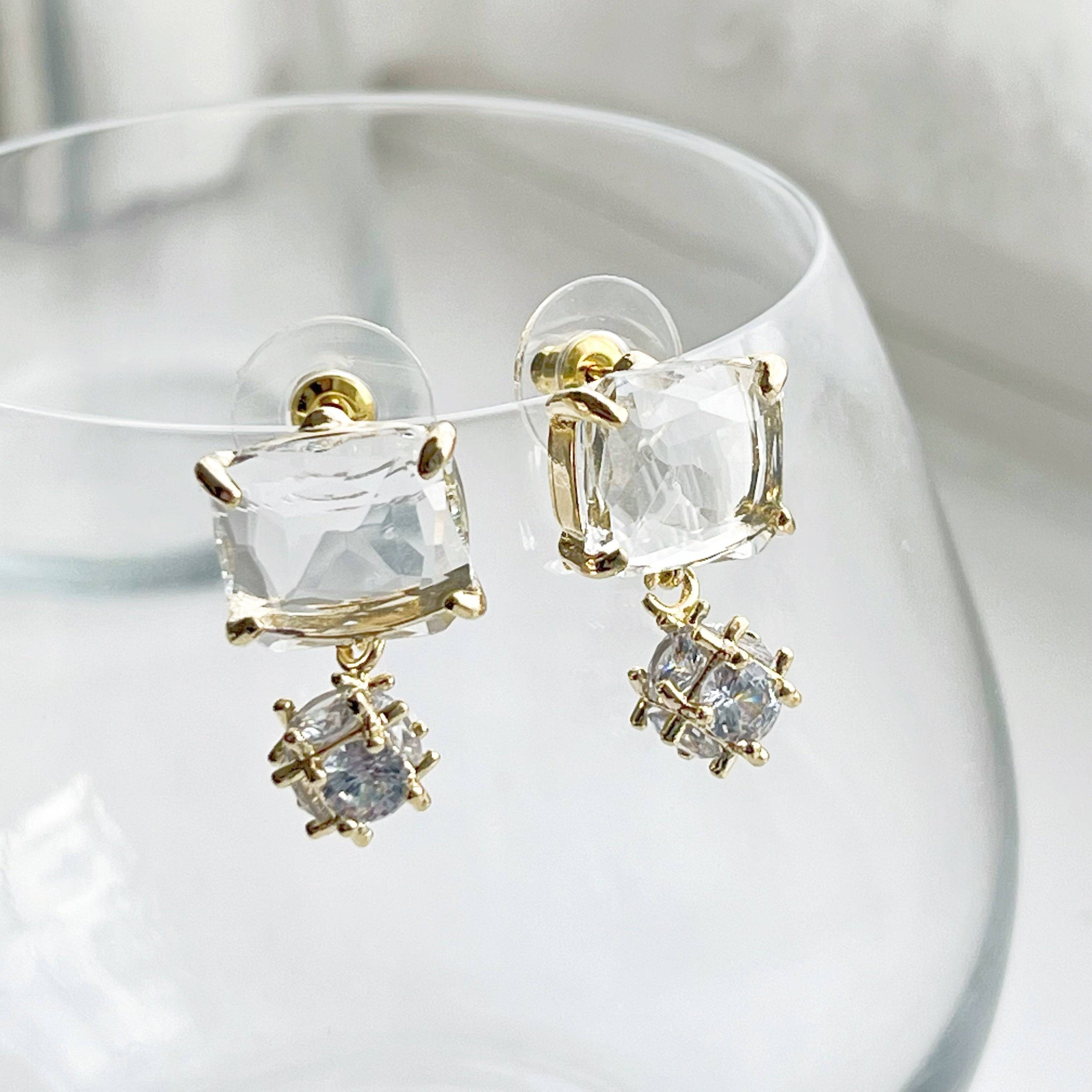 Elegant Square Ice Cube Crystal Stud Earrings with Little Drops, featuring sterling silver and gold-coated bronze materials.