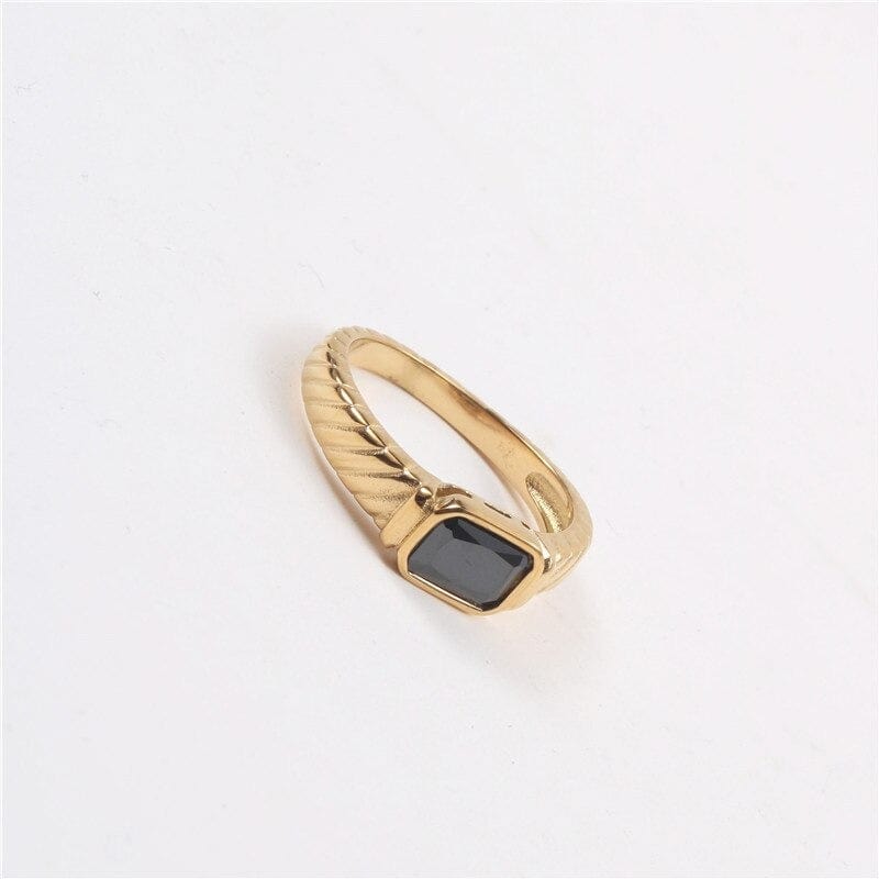 Square Threader Obsidian Crystal Ring featuring a black cubic cut CZ stone set in 18k gold plated stainless steel, showcasing a minimalist geometric design.
