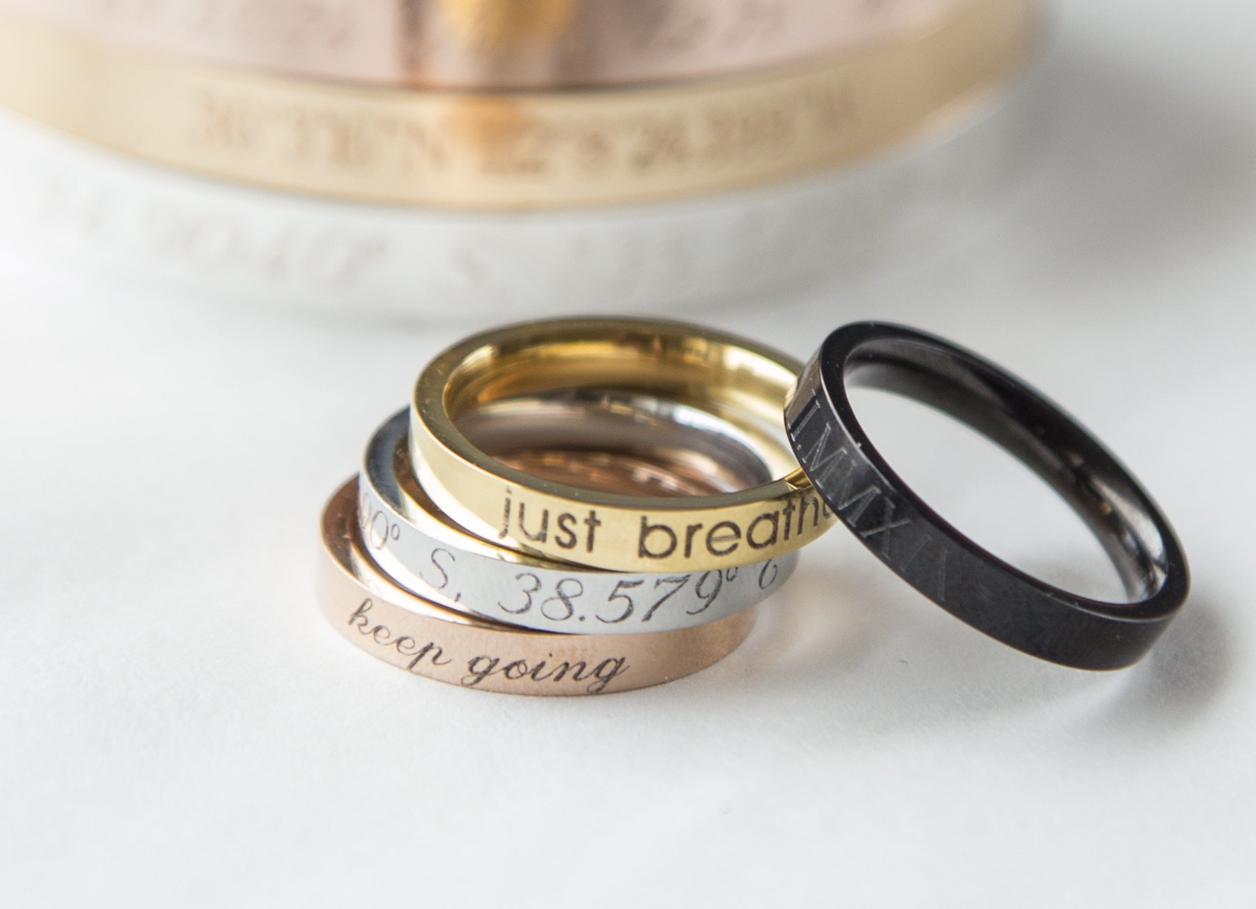 A beautifully crafted Stacking Ring Engraved Ring in gold, showcasing its elegant design and custom engraving options.