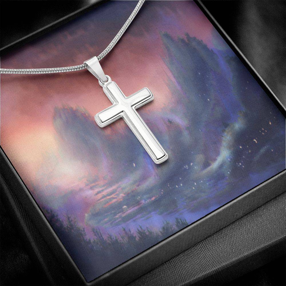 A beautifully crafted stainless steel cross necklace featuring an adjustable snake chain and lobster clasp, suitable for all ages.