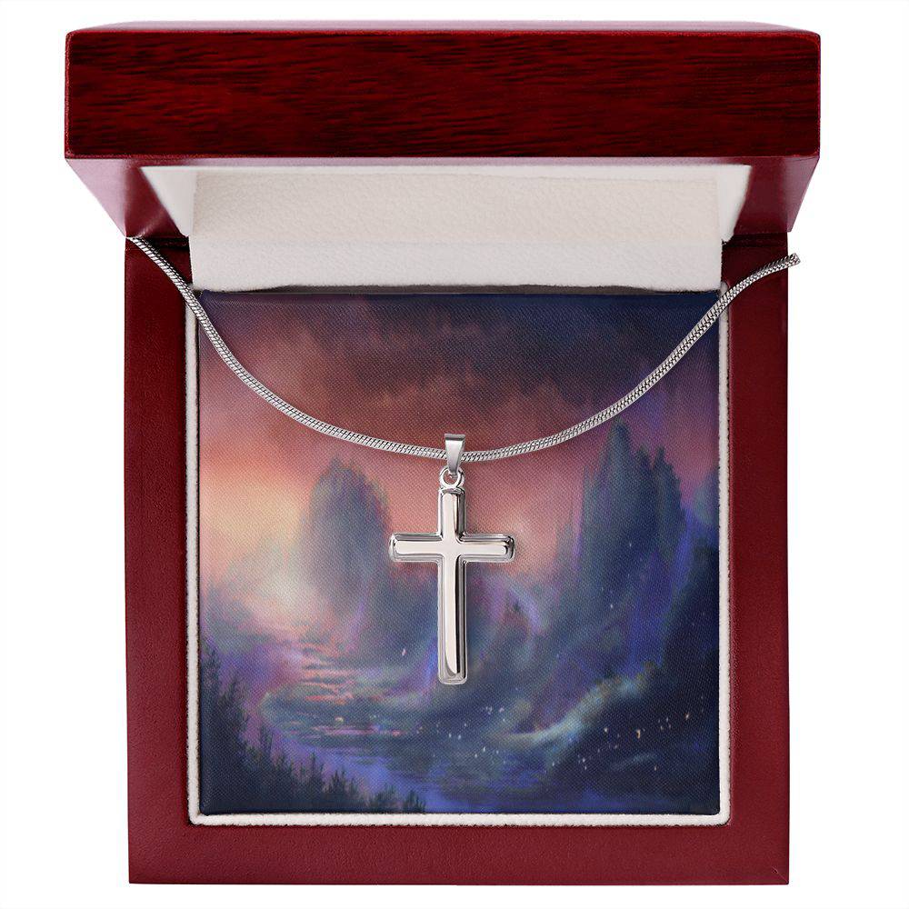 A beautifully crafted stainless steel cross necklace featuring an adjustable snake chain and lobster clasp, suitable for all ages.