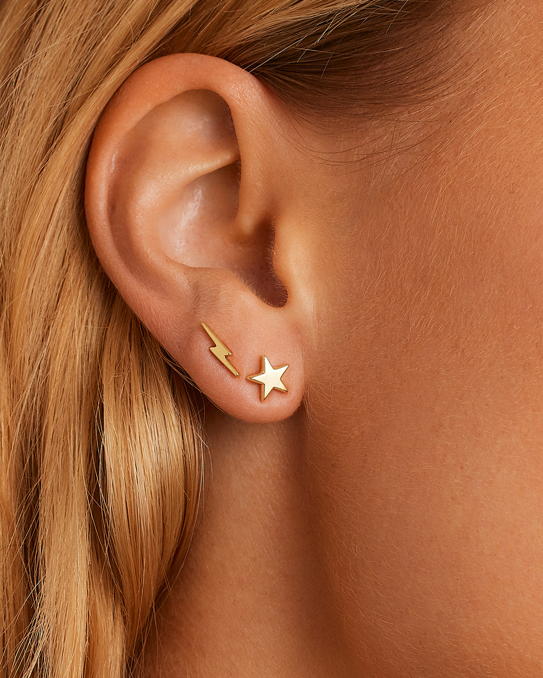 Elegant Star Charm Stud earrings featuring a celestial star design, crafted from high-quality materials.