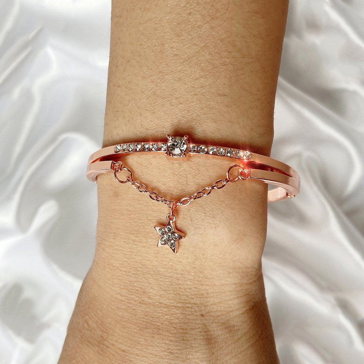 Elegant Star Drop Bracelet featuring Austrian Crystals, 18K rose gold plated, made in Italy, showcasing a stunning design.