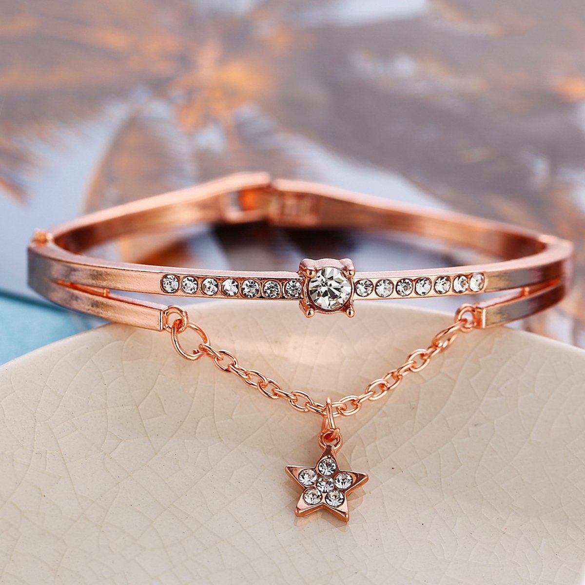 Elegant Star Drop Bracelet featuring Austrian Crystals, 18K rose gold plated, made in Italy, showcasing a stunning design.
