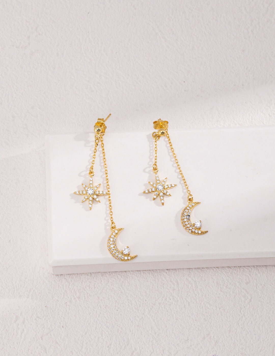 Star & Moon Zircon Drop Earrings featuring zircon stones set in sterling silver with gold vermeil plating, elegantly designed for a celestial look.
