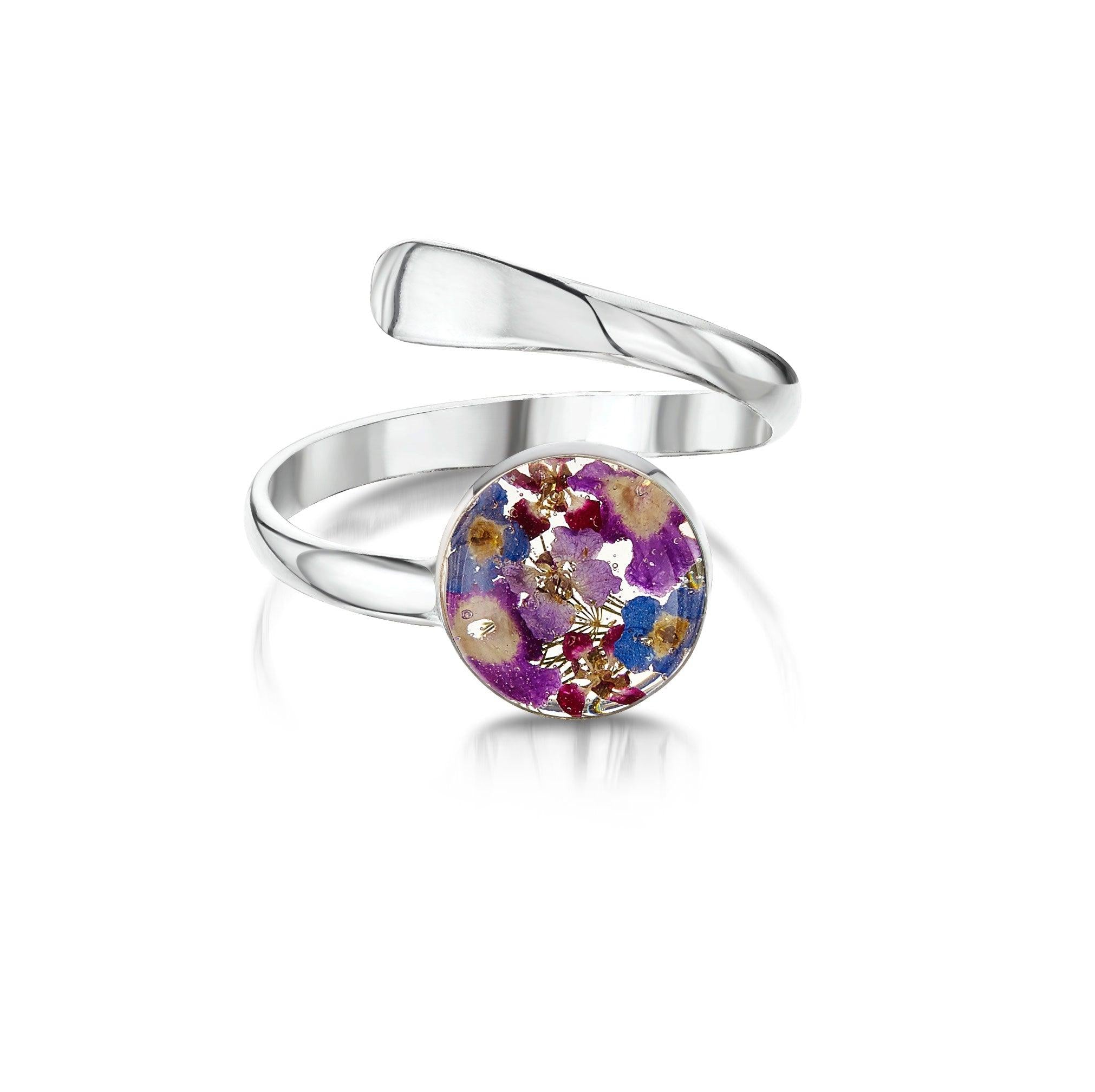 Handmade sterling silver adjustable ring with vibrant purple verbenas, showcasing intricate craftsmanship and unique design.