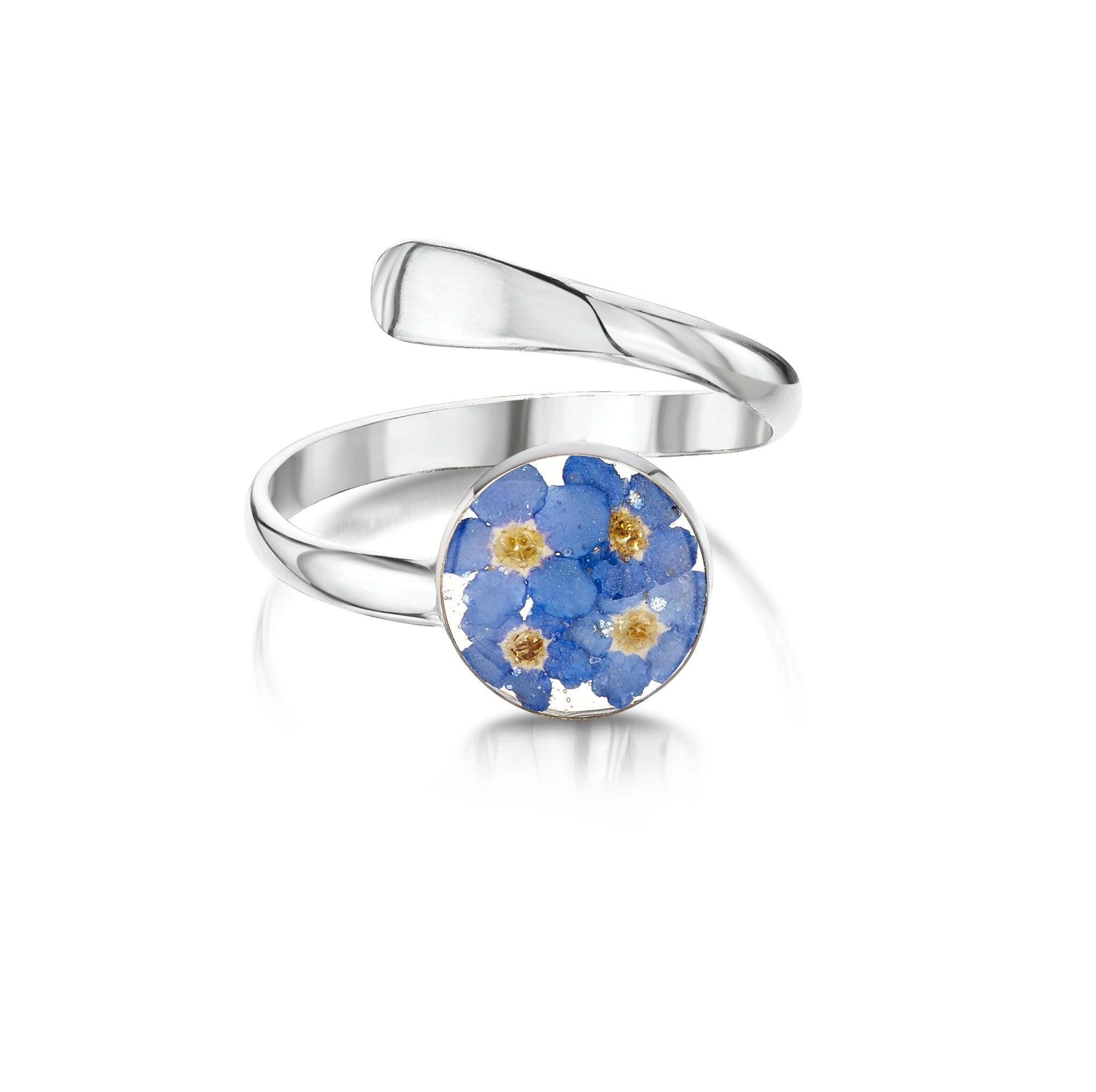 Sterling Silver Adjustable Ring featuring real Forget-Me-Not flowers, elegantly designed for any finger size.