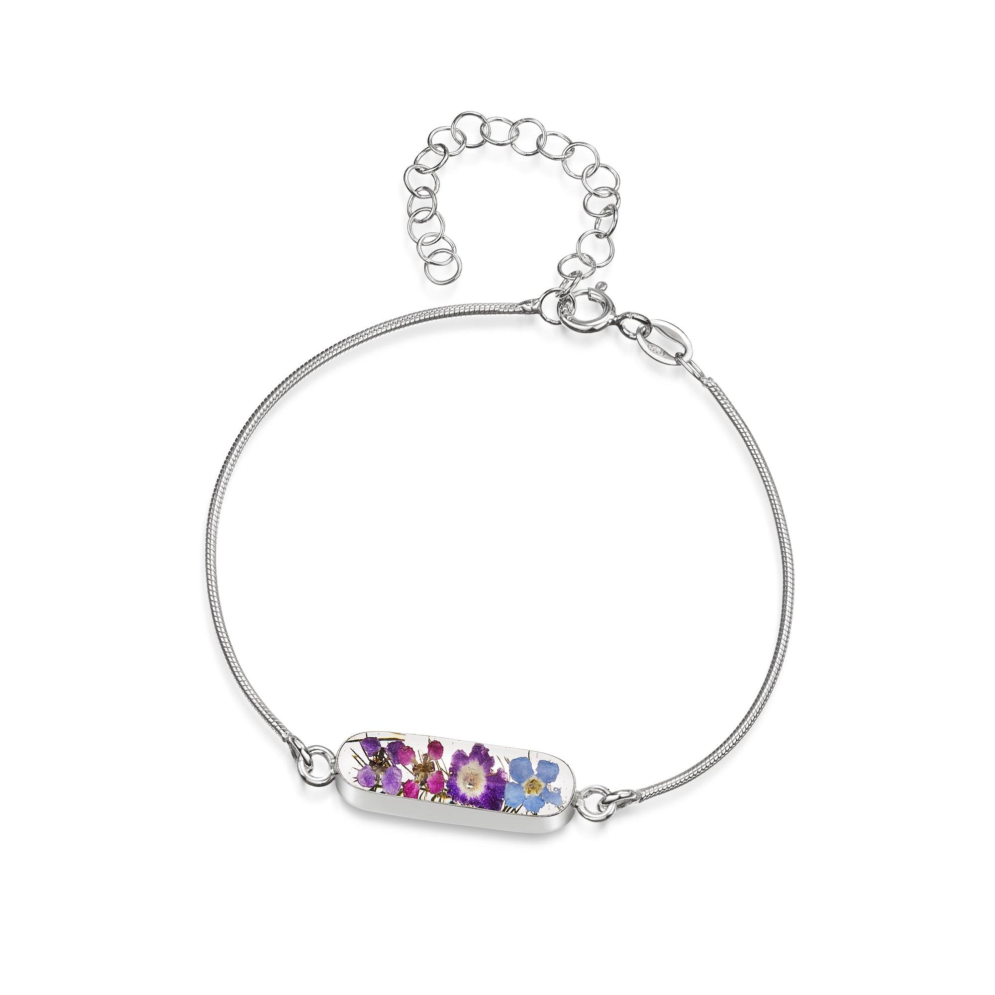 Sterling silver anti-tarnish snake bracelet featuring tiny purple flowers and a flower charm, elegantly displayed in a gift box.