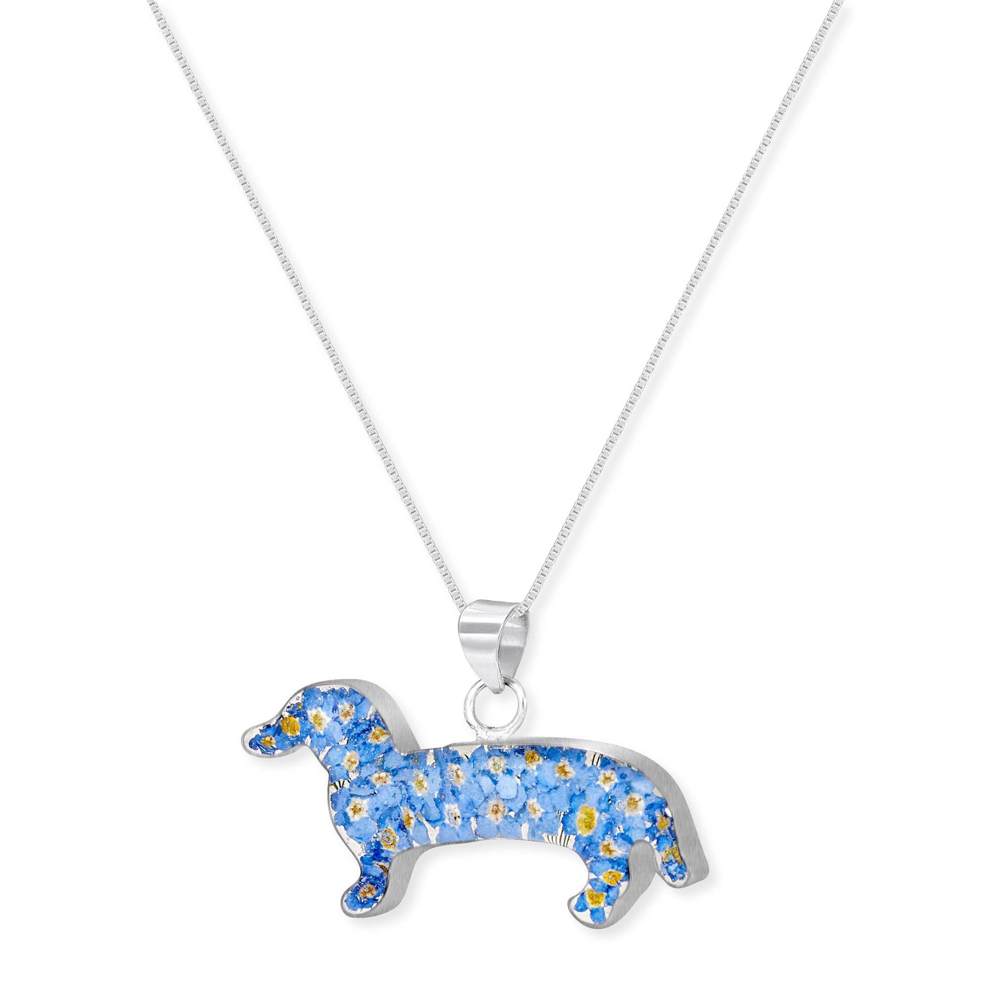 Sterling Silver Dachshund Pendant featuring real forget-me-not flowers, elegantly designed for dog lovers.
