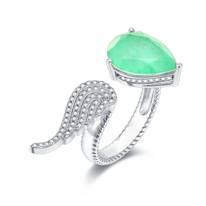 Sterling silver feather open ring with white sapphire, showcasing intricate design and real white gold finish.