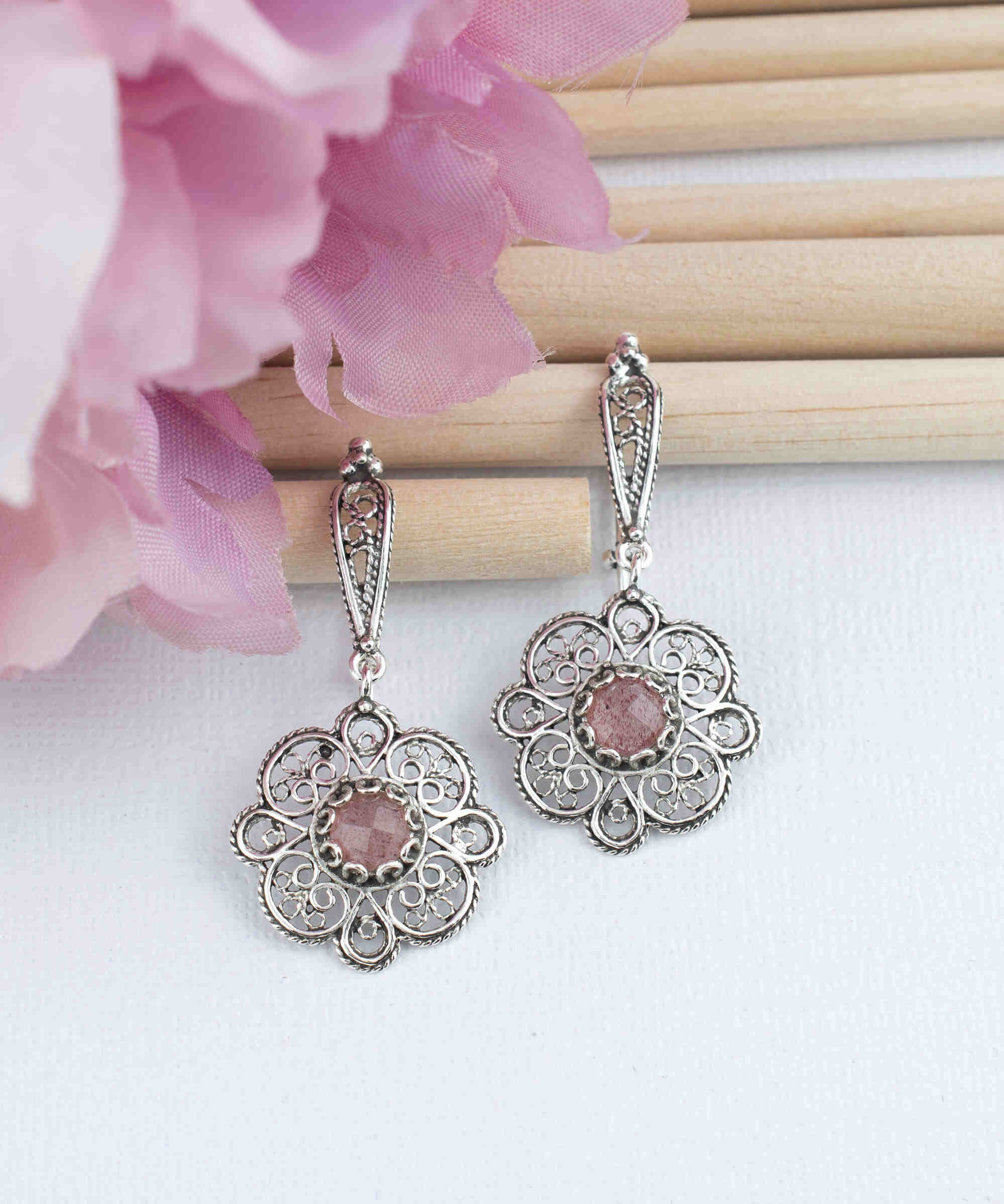 Handmade 925 sterling silver dangle drop earrings featuring intricate filigree art and a vibrant Cherry Quartz gemstone.