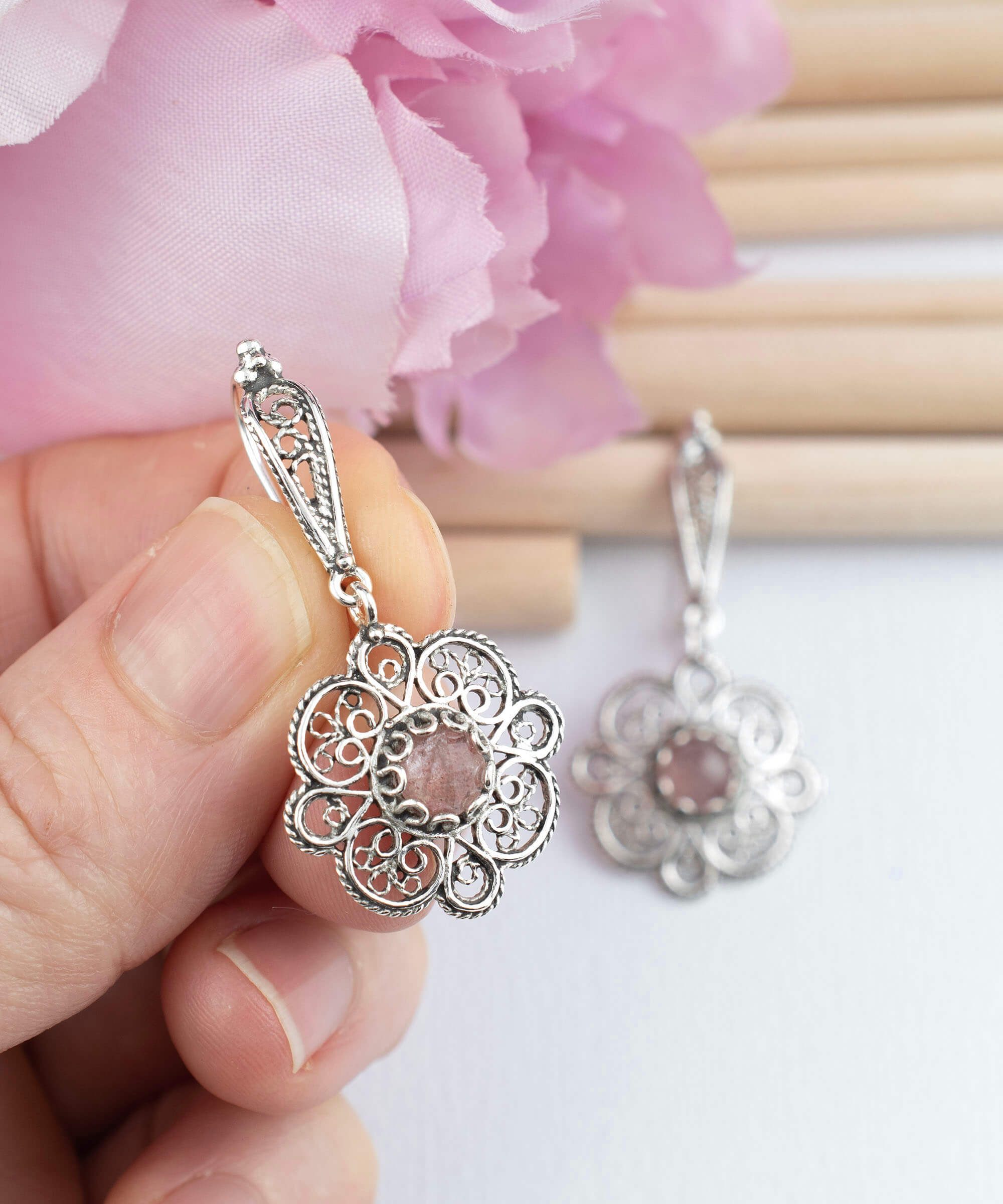 Handmade 925 sterling silver dangle drop earrings featuring intricate filigree art and a vibrant Cherry Quartz gemstone.