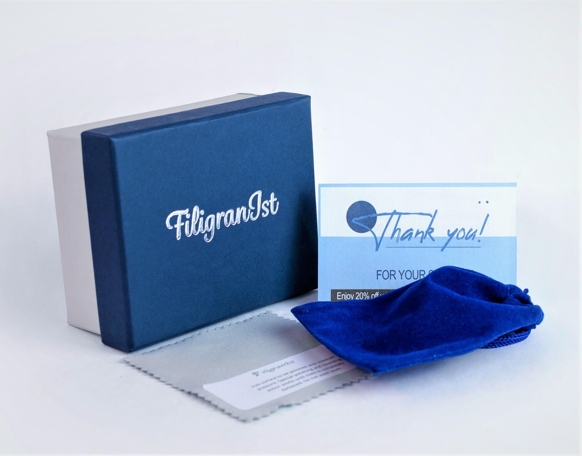 Handmade 925 sterling silver dangle drop earrings featuring intricate filigree art and a vibrant Cherry Quartz gemstone.