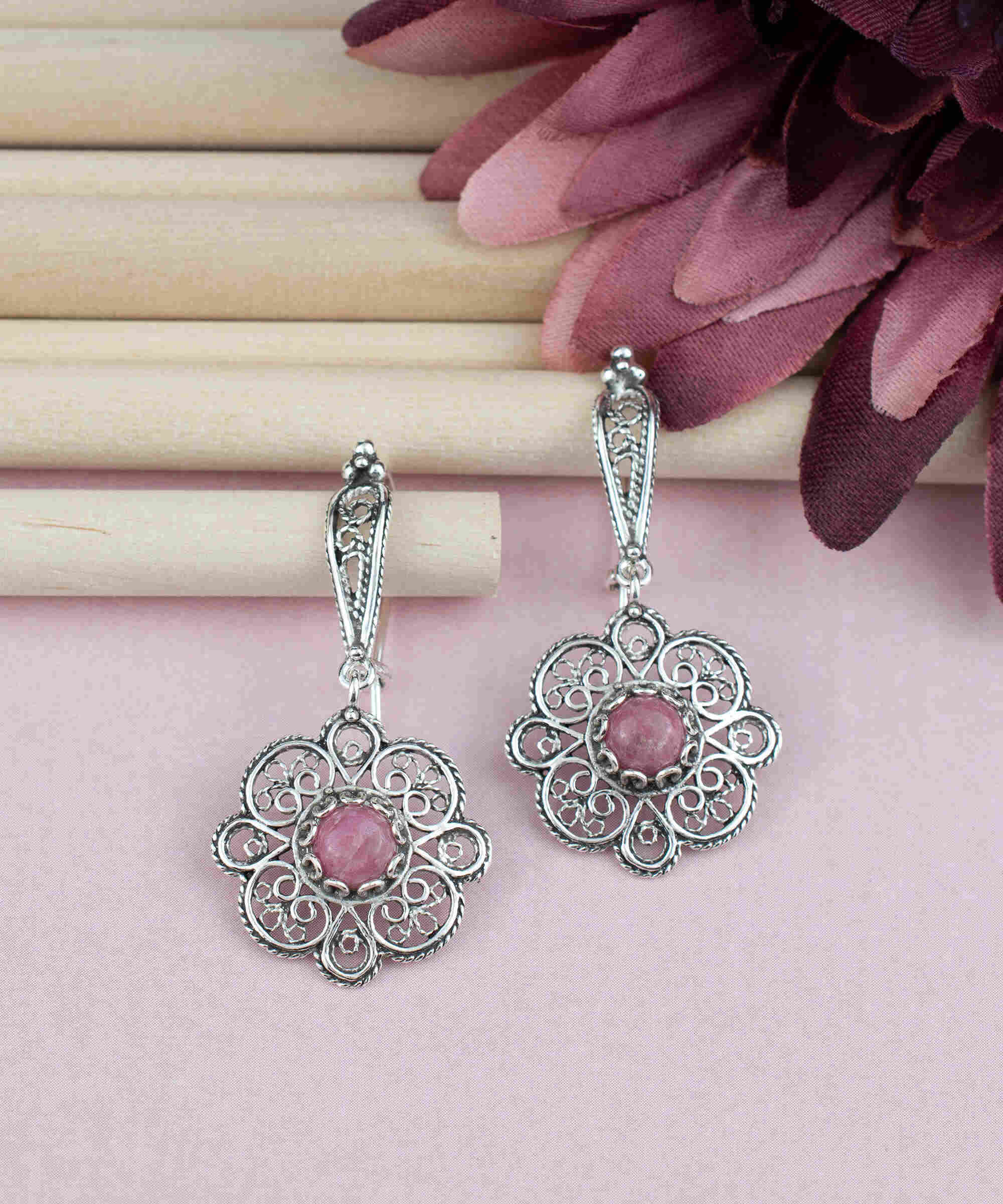 Handmade 925 sterling silver dangle drop earrings featuring intricate filigree art and a stunning Rhodonite gemstone.