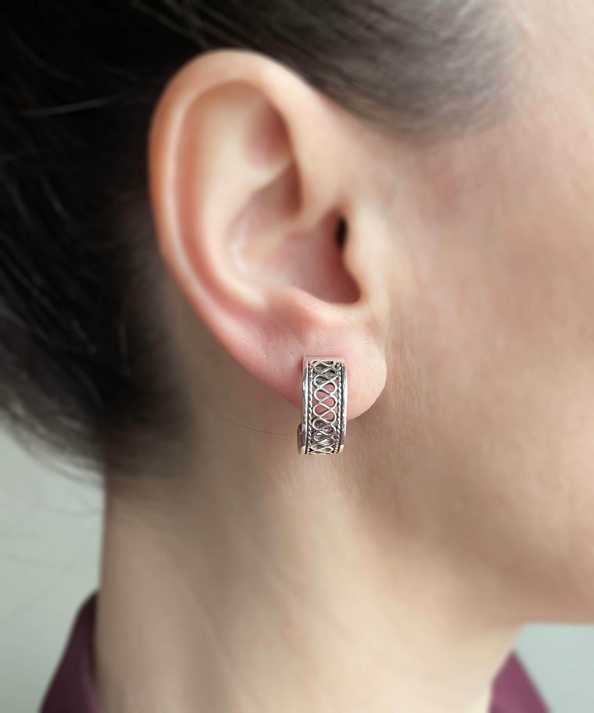 Sterling Silver Filigree C-Hoop Stud Earrings showcasing intricate design and polished finish, perfect for women.