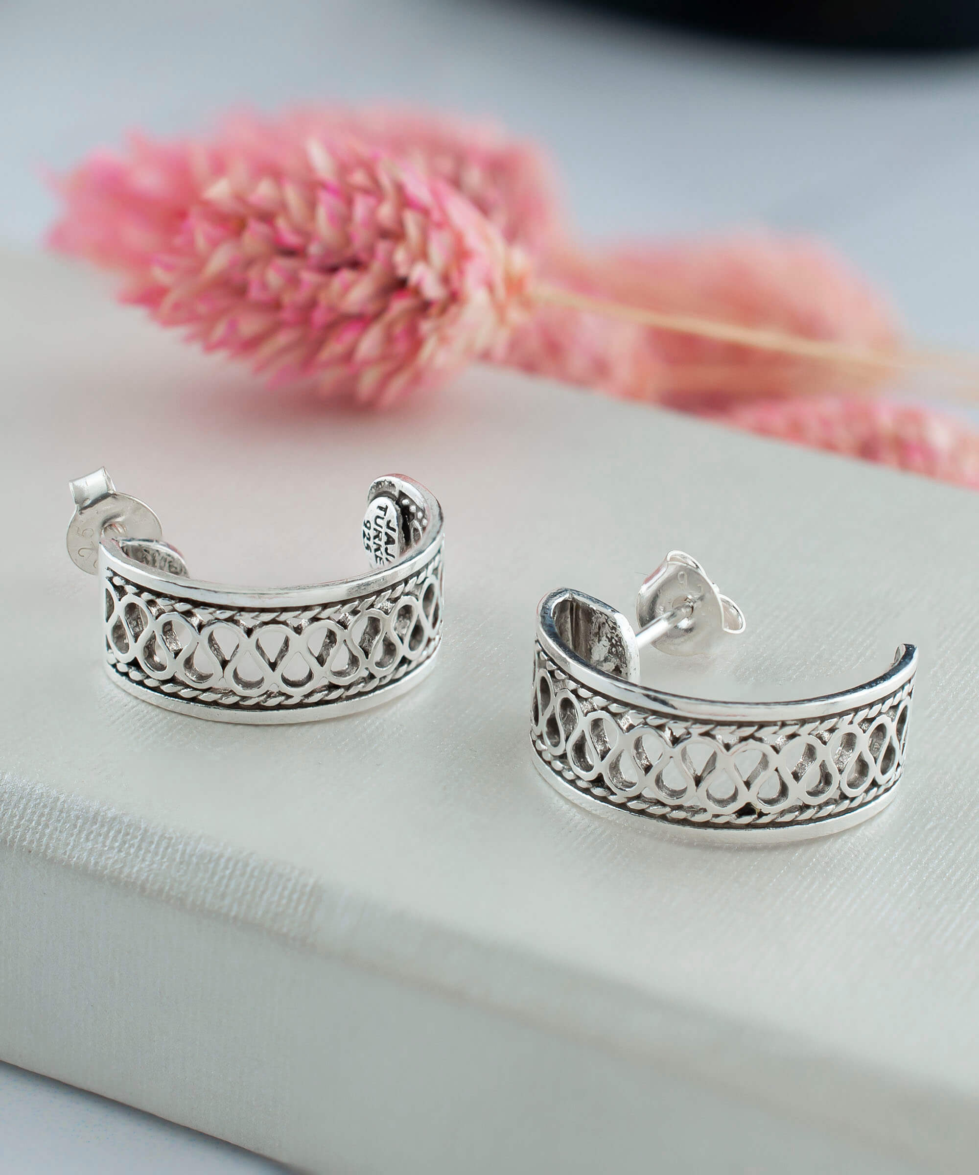 Sterling Silver Filigree C-Hoop Stud Earrings showcasing intricate design and polished finish, perfect for women.