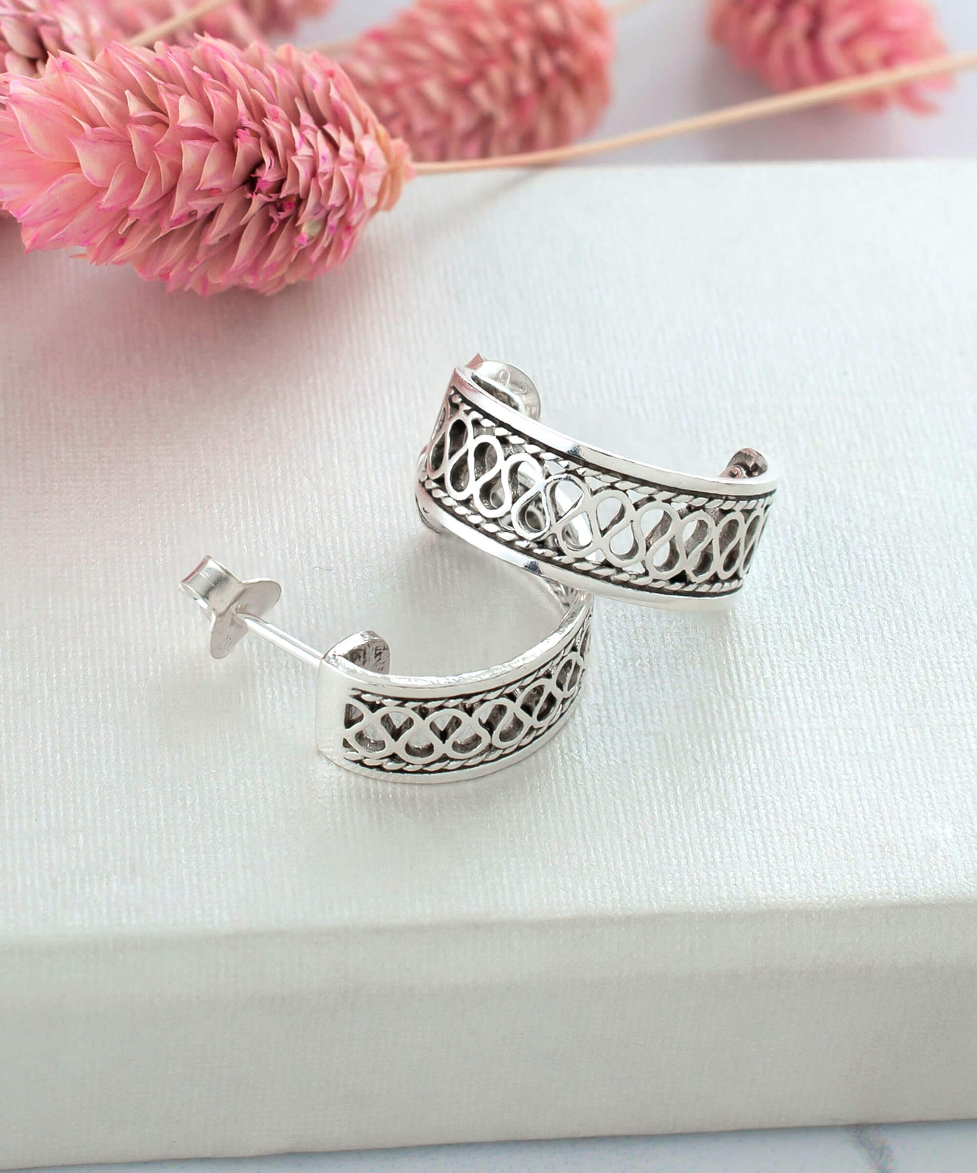 Sterling Silver Filigree C-Hoop Stud Earrings showcasing intricate design and polished finish, perfect for women.