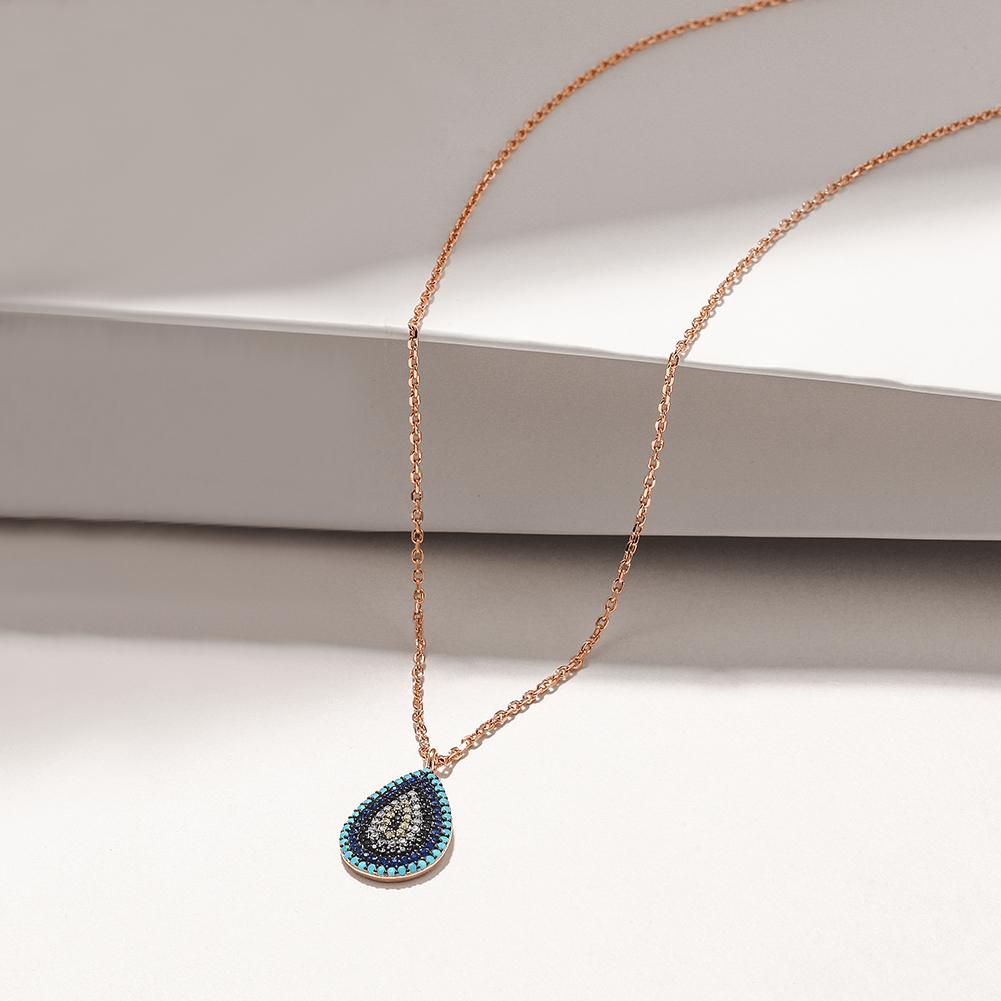 Sterling silver oval evil eye necklace featuring Nano Turquoise and zircon stones, elegantly designed for spiritual protection.