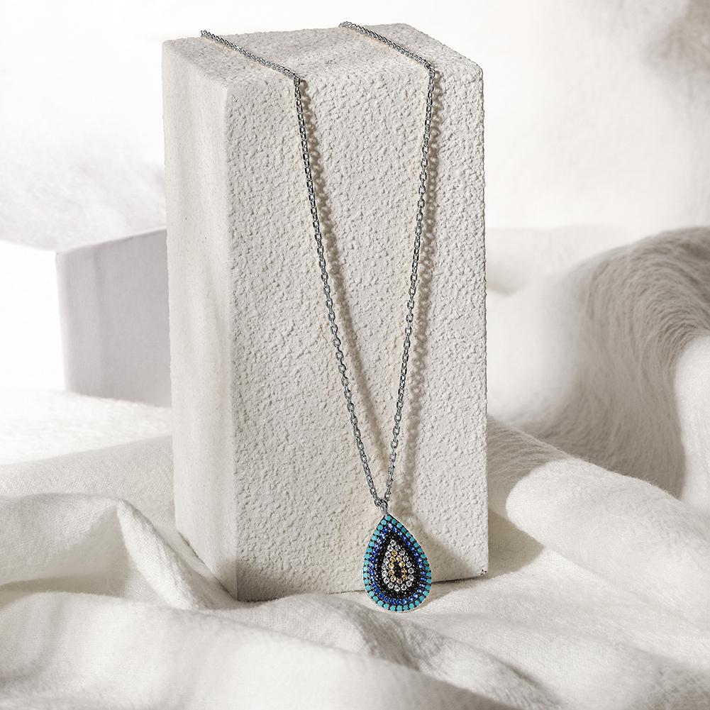 Sterling silver oval evil eye necklace featuring Nano Turquoise and zircon stones, elegantly designed for spiritual protection.