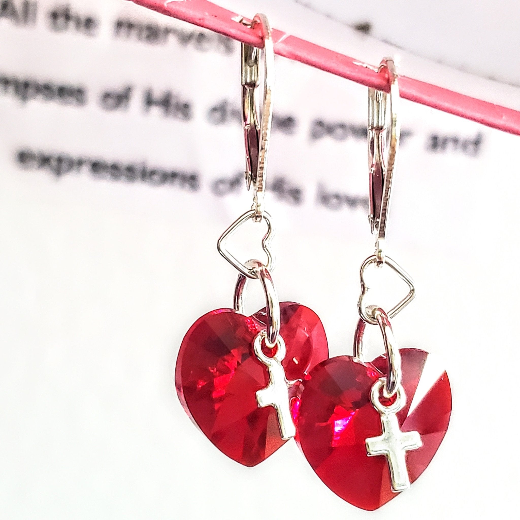 Sterling Silver Red Heart Crystal I Love You Jesus Earrings featuring a sparkling red Swarovski crystal heart pendant and optional cross charm.