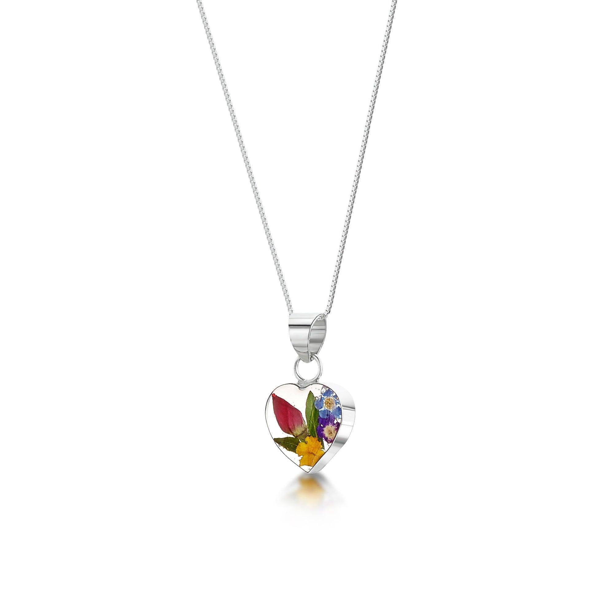 Sterling Silver Small Heart Pendant Necklace featuring real mixed flowers, displayed elegantly with an adjustable silver chain.