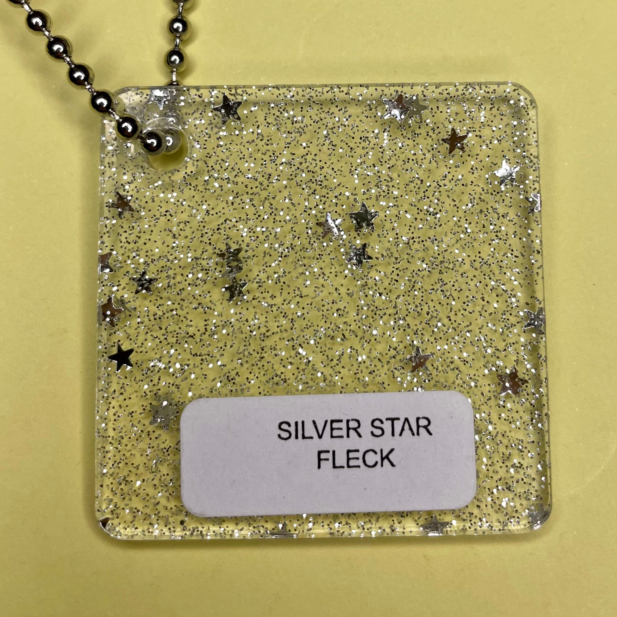 Stevie Moon Wall Hanging featuring laser cut stars in customizable colors, measuring 24cm by 22cm.