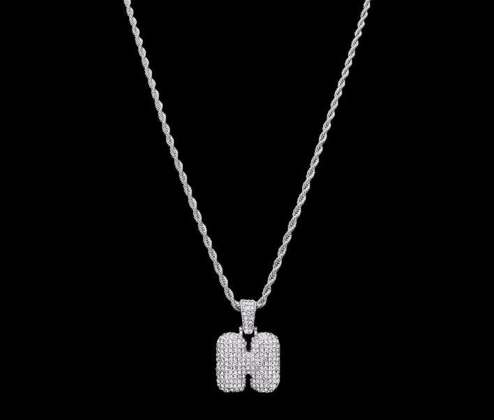 STILTR Stainless Bubble Necklace featuring a rhinestone-studded pendant on a solid rope chain, elegantly displayed.