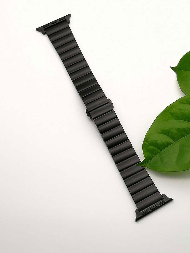 Stainless steel strap for Apple Watch in various colors, showcasing its elegant design and butterfly buckle clasp.