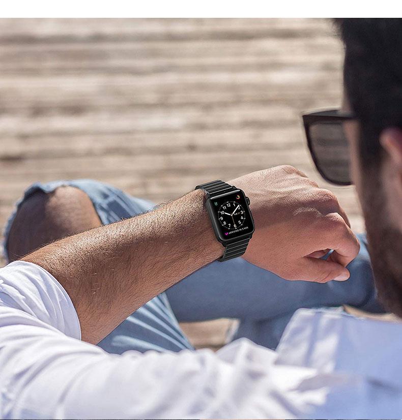 Stainless steel strap for Apple Watch in various colors, showcasing its elegant design and butterfly buckle clasp.