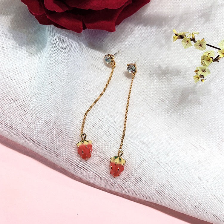 A beautiful assortment of jewelry from the Strawberry Collection, featuring stud earrings, drop earrings, and a pendant necklace, all crafted from alloy and 925 silver.