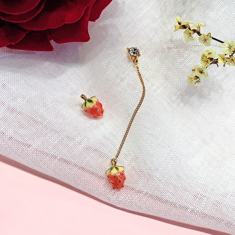 A beautiful assortment of jewelry from the Strawberry Collection, featuring stud earrings, drop earrings, and a pendant necklace, all crafted from alloy and 925 silver.