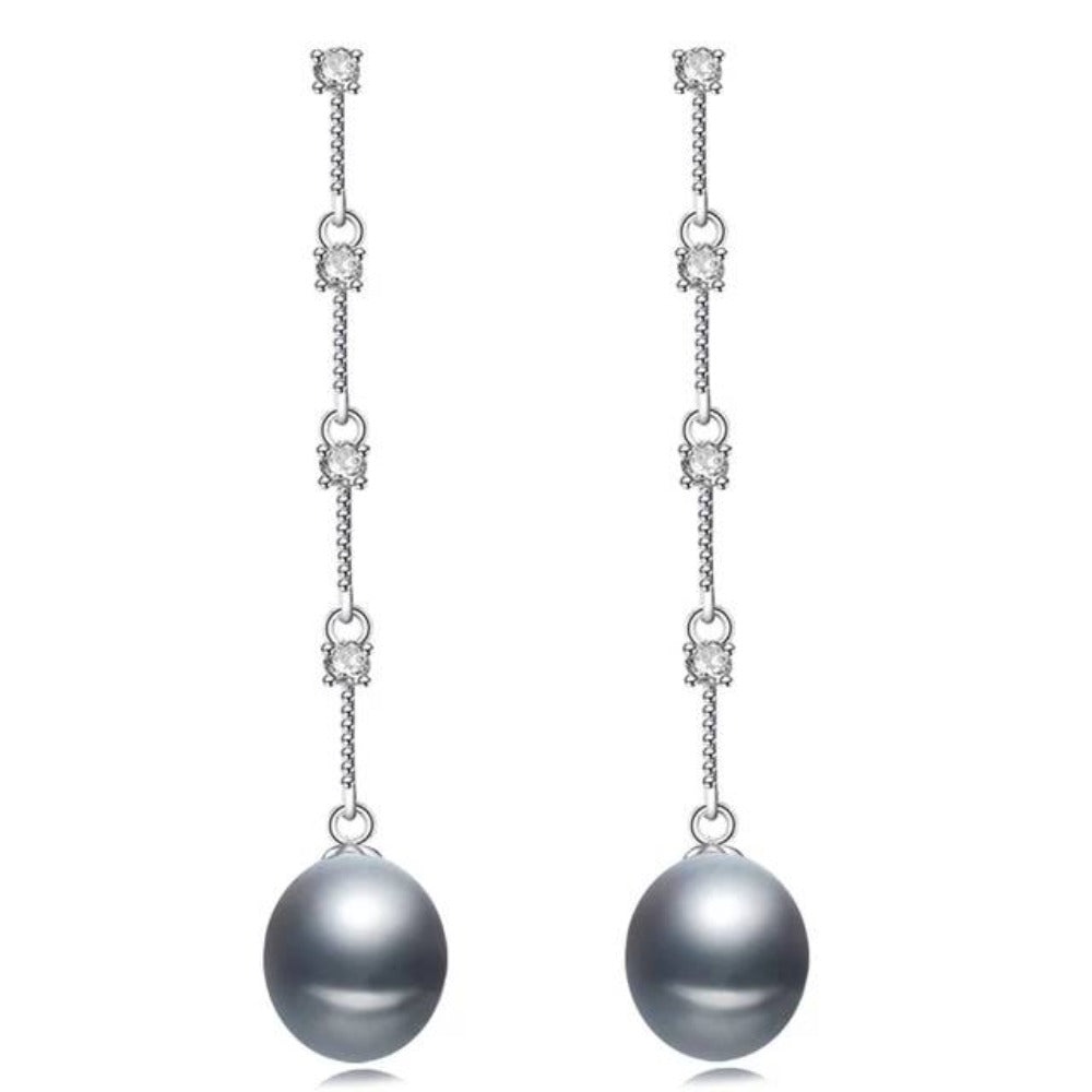 A pair of stunning dangle earrings featuring simulated diamonds and genuine freshwater pearls in various colors.