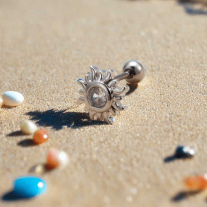 A stylish Sun Cartilage Earring made of high-quality 316L Stainless Steel, featuring a sun design, perfect for summer wear.