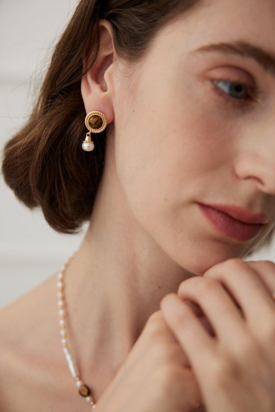 Vintage elegance Tiger's Eye and Pearl Pendant Earrings crafted from 925 silver, featuring a unique design with warm hues and natural pearls.