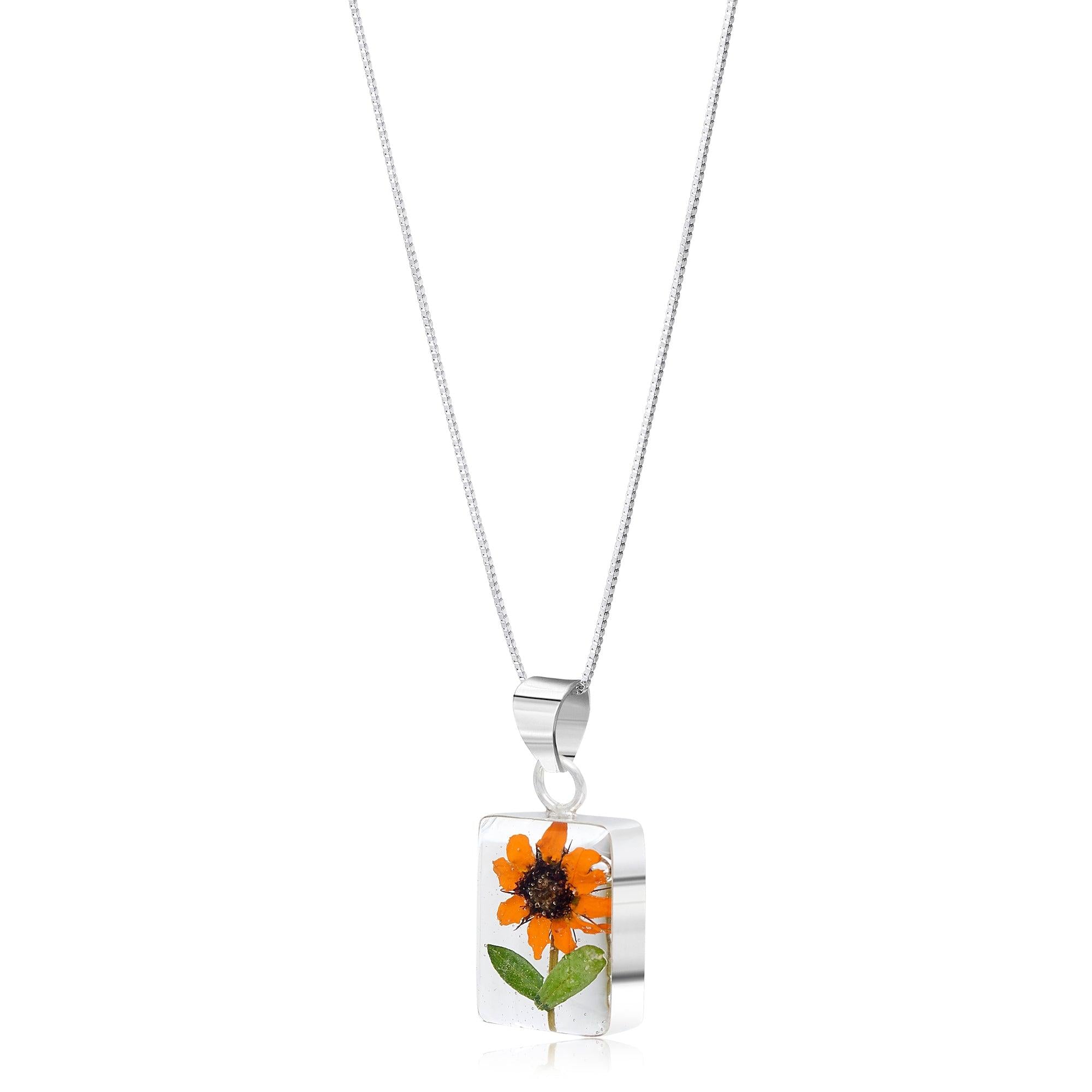 Sterling silver sunflower pendant necklace by Shrieking Violet, featuring real flowers in a rectangle design with an adjustable chain.