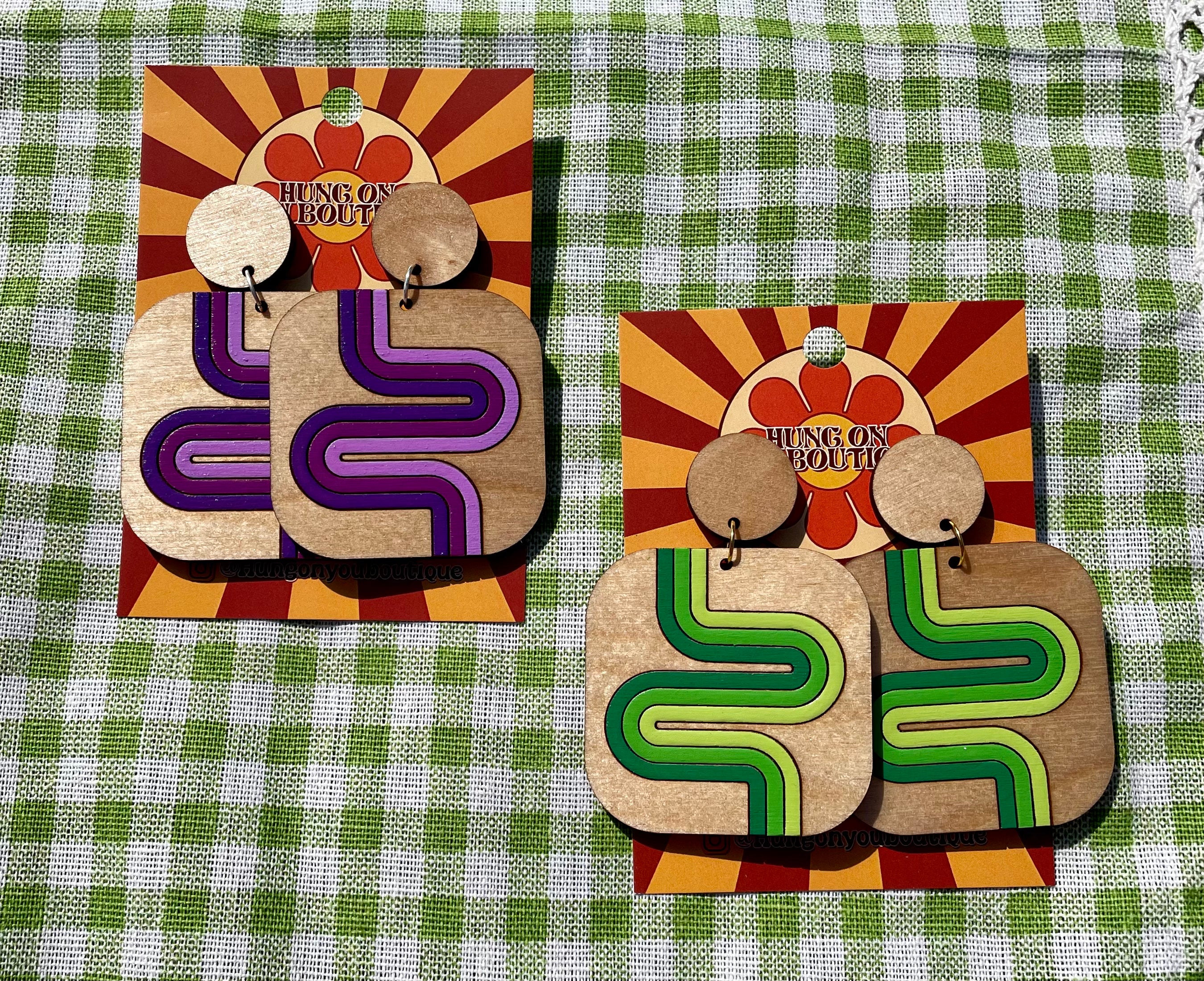 Colorful Supergraphics Square Earrings made from laser-cut birch plywood, featuring a geometric design inspired by 1960s and 70s fashion.