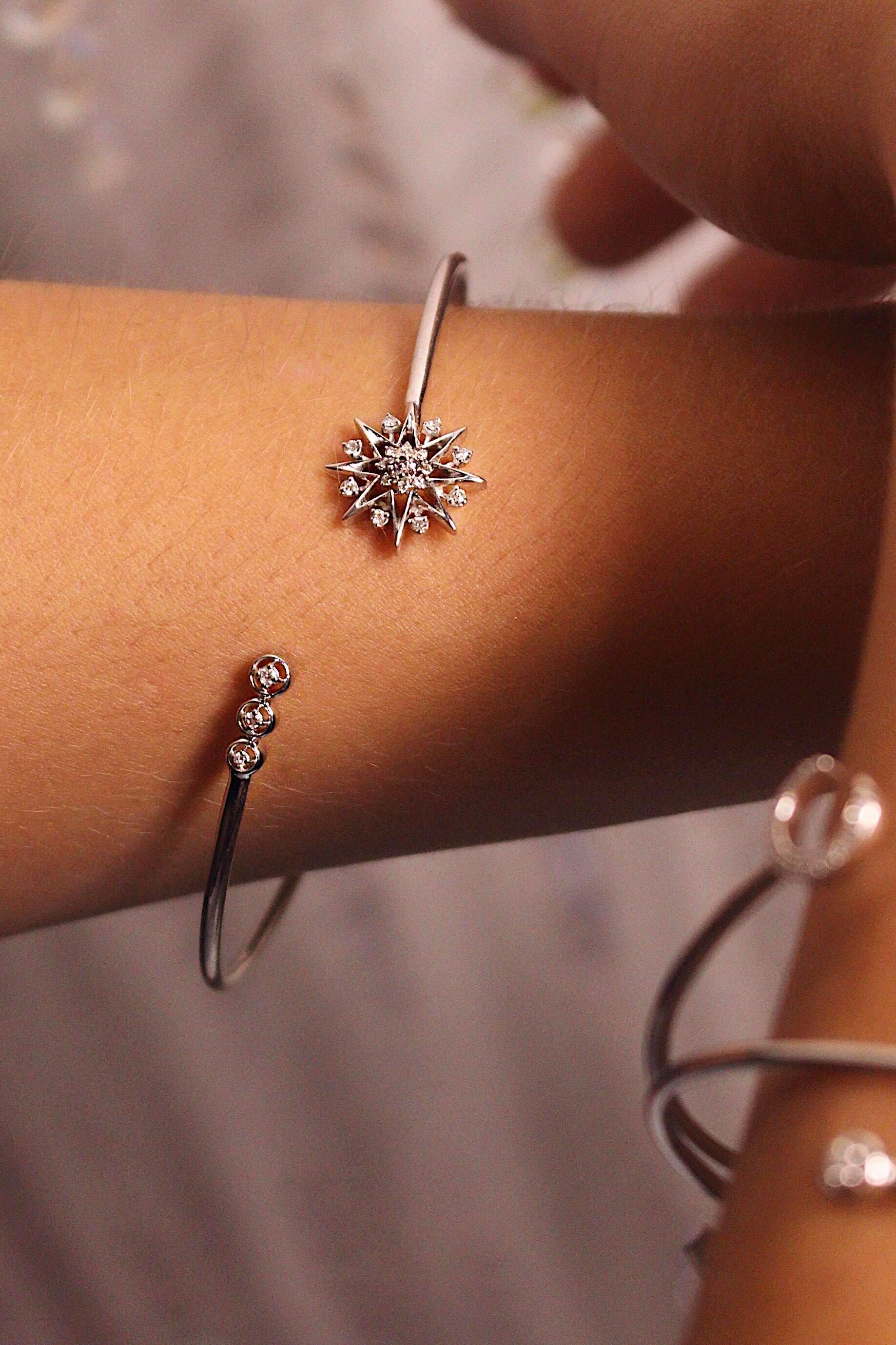 Supernova Star Adjustable Diamond Cuff in Sterling Silver featuring genuine diamonds, showcasing its elegant design and adjustable feature.