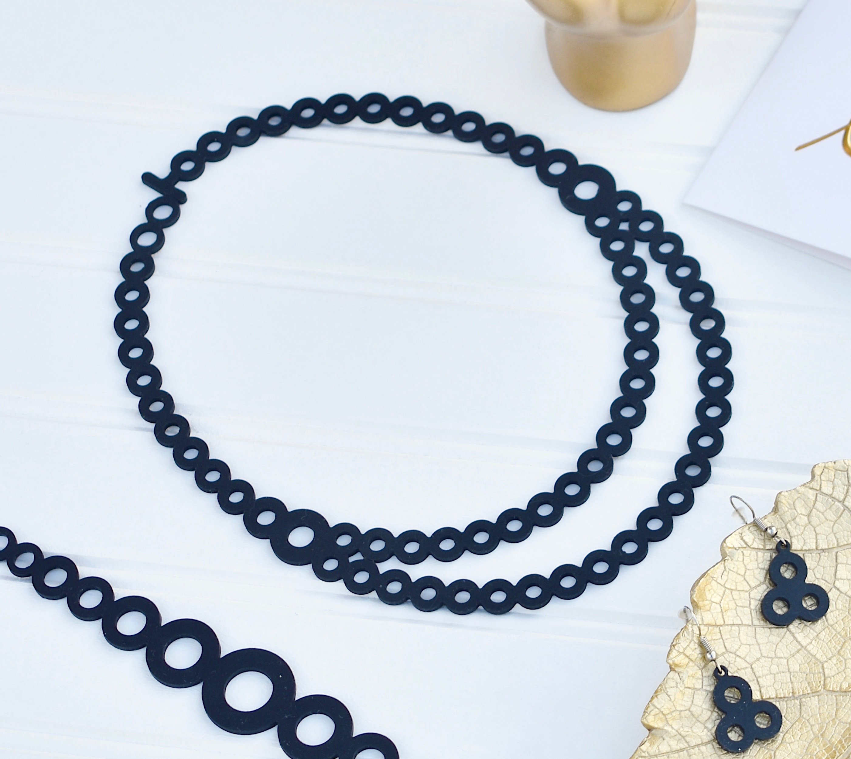 A beautiful Sweet Necklace displayed elegantly, showcasing its lightweight and flexible design, perfect for any occasion.