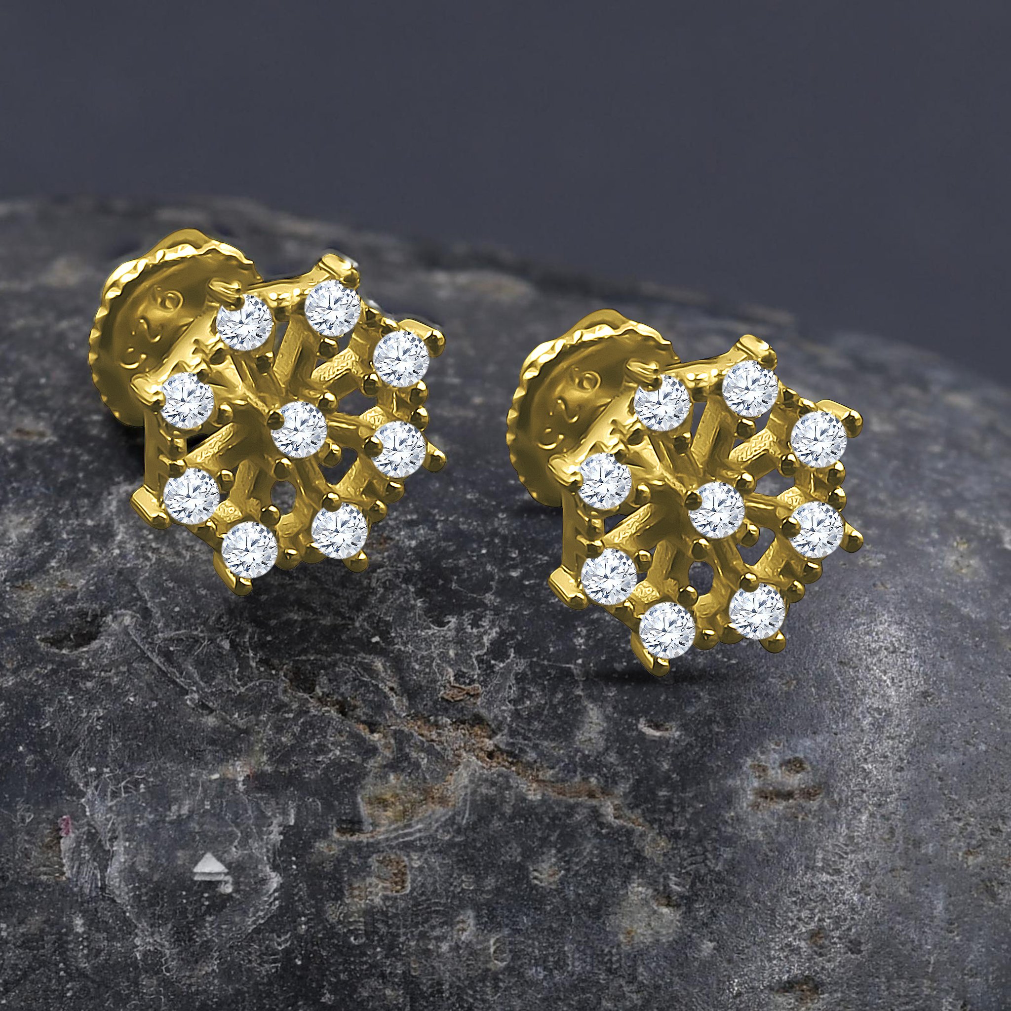 A pair of elegant Swivel Screw Back earrings featuring white cubic zirconia stones set in brass copper metal, showcasing a unique swivel design.