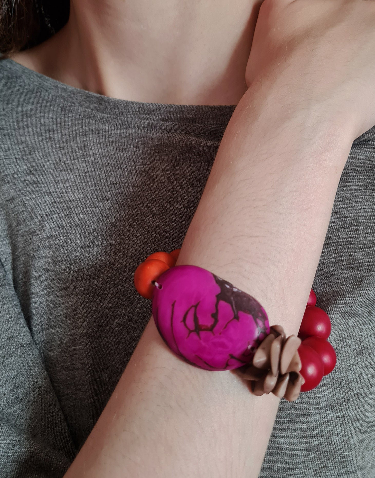 Tapajos Chunky Bracelet in Berry Crumble, showcasing unique tagua nut shapes and vibrant colors.