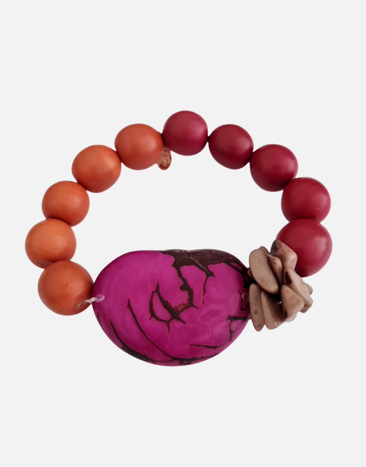 Tapajos Chunky Bracelet in Berry Crumble, showcasing unique tagua nut shapes and vibrant colors.