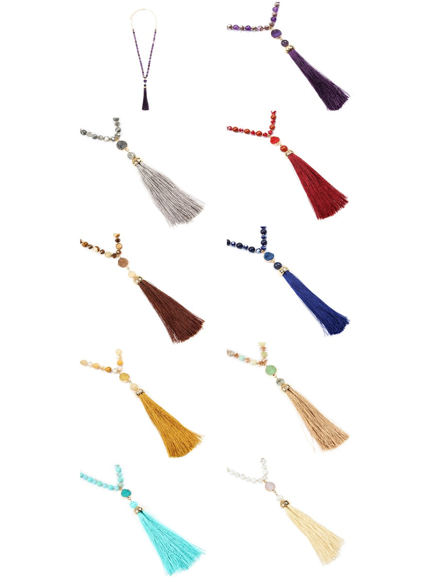 A vibrant collection of Tassel Natural Stone Necklaces by DOBBI featuring various colors and stylish tassels.