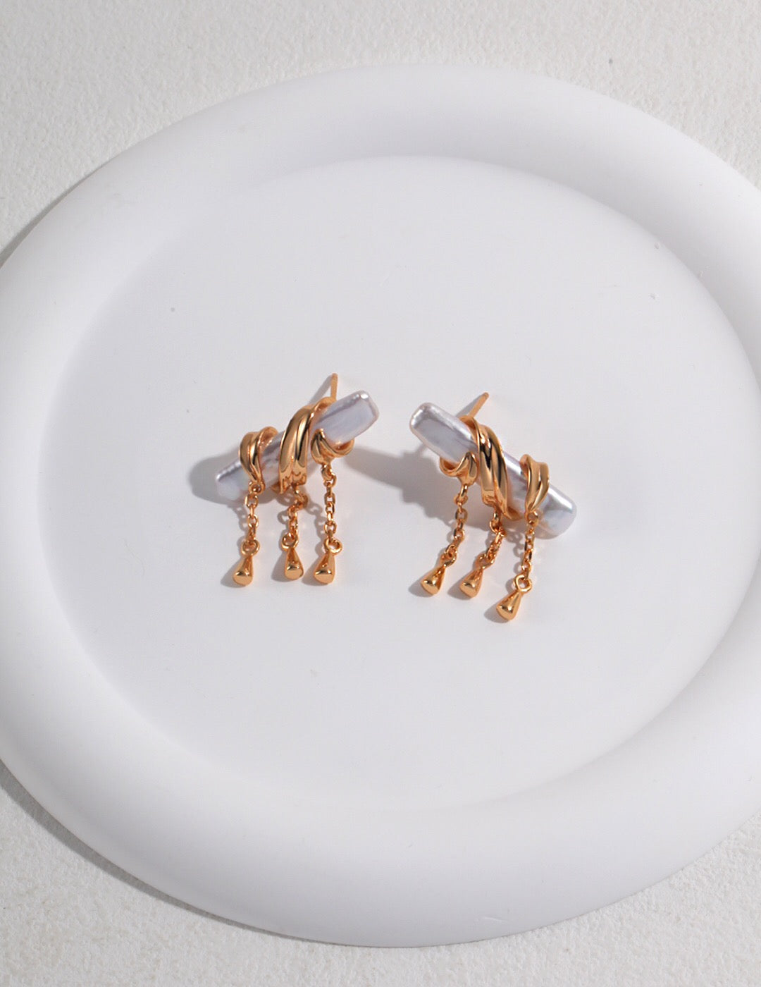 Elegant tassel wrapped baroque pearl earrings featuring freshwater pearls and gold vermeil, perfect for any occasion.