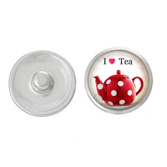 A hand-pressed I Love Tea Snap, 7/8” round, showcasing a tea-themed design, perfect for customizing jewelry.