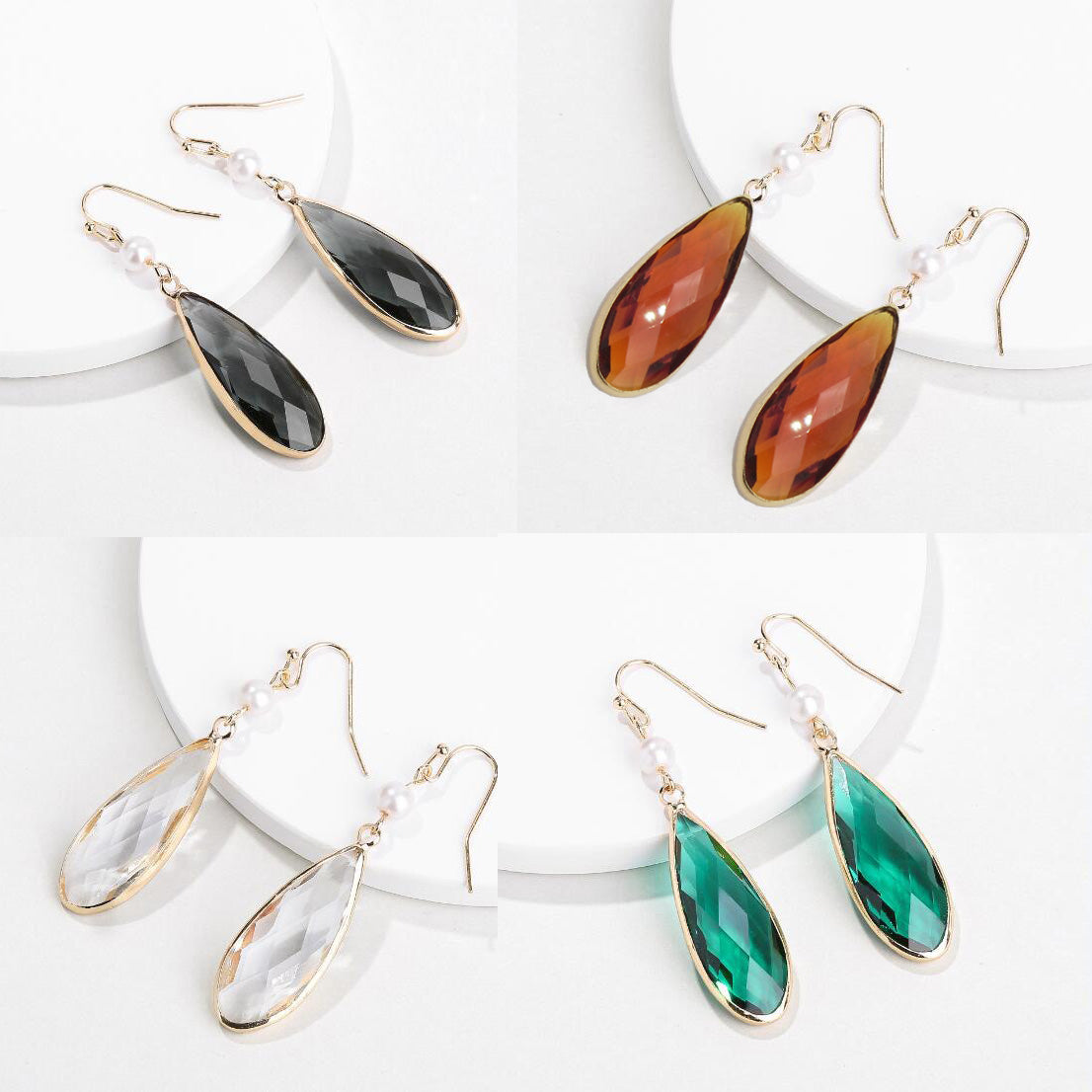 A pair of elegant Tear Drop Stone Hook Earrings by DOBBI, showcasing a beautiful glass design in various colors, perfect for summer wear.