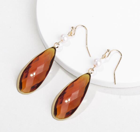 A pair of elegant Tear Drop Stone Hook Earrings by DOBBI, showcasing a beautiful glass design in various colors, perfect for summer wear.