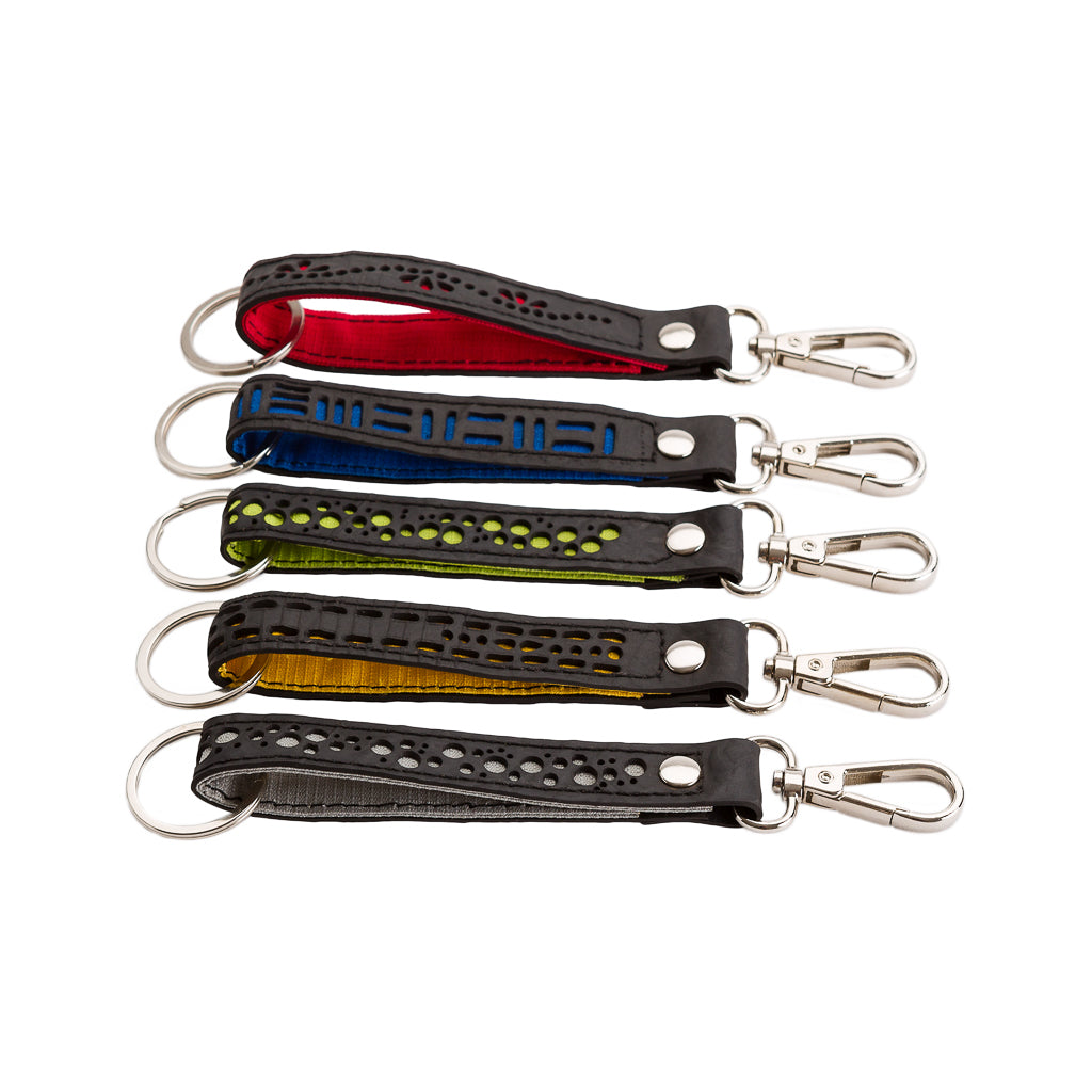 Thor Double Ended Inner Tube Vegan Keyring made from recycled rubber, featuring unique handcrafted designs and colorful fabric backing.