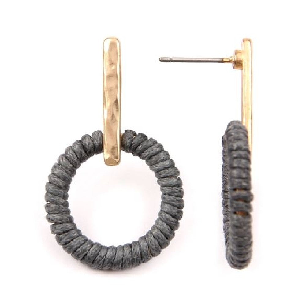 Colorful thread wrapped hoop post earrings displayed elegantly, showcasing their unique design and vibrant colors.